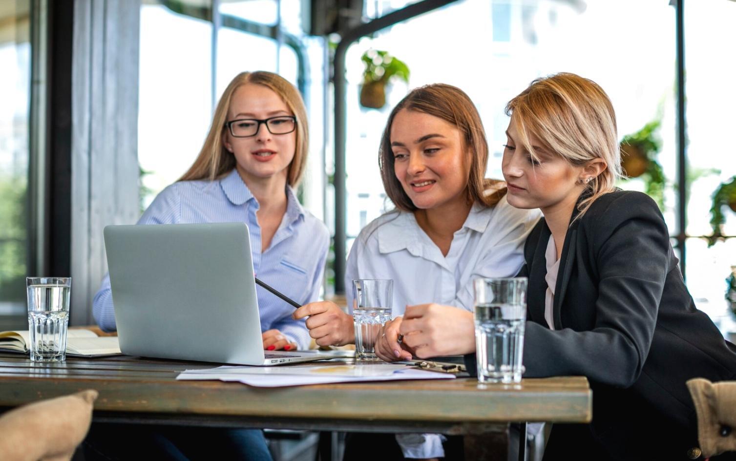 Financial planning workshop attendees reviewing budgeting strategies